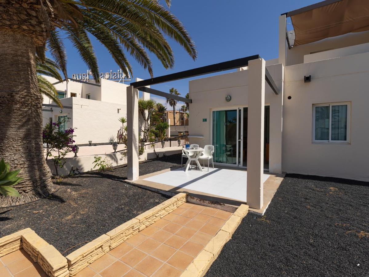 Homeforguest Apartamento 13 Con Terraza Y Piscina En Коралео Екстериор снимка